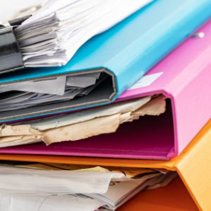 Image of binders stuffed with papers